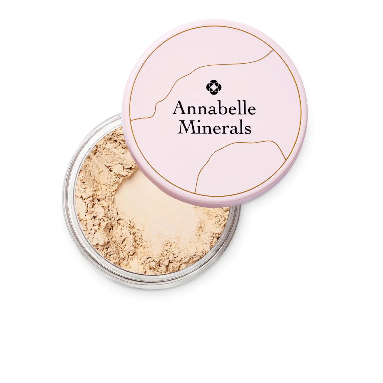 A jar of Annabelle Minerals loose clay eye shadow in a milky-white color, with the brand name and a small cross logo on the lid.