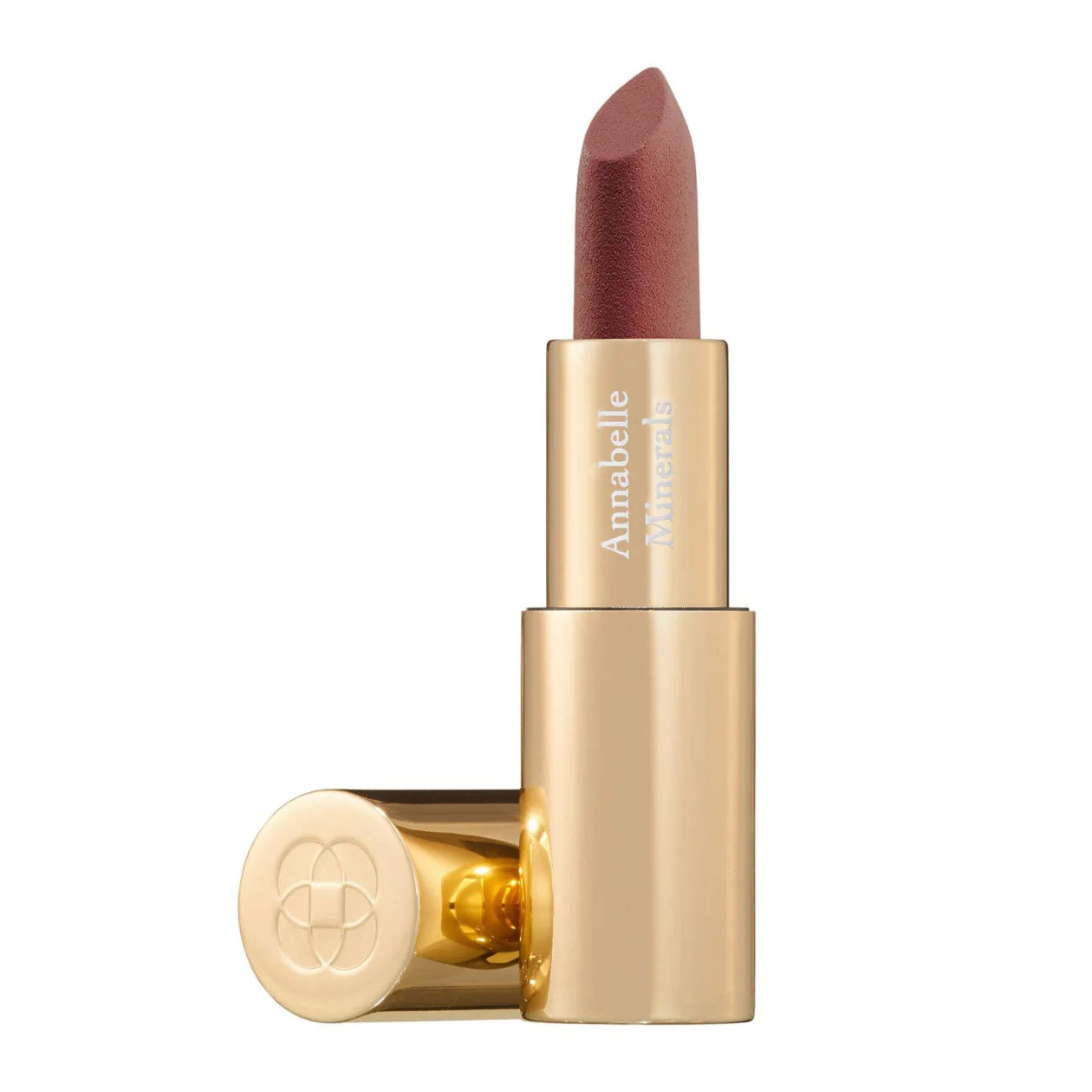 A gold-colored lipstick tube with the brand name 'Annabelle' on it, the shade of the lipstick is a warm brown, described as 'Coconut'.