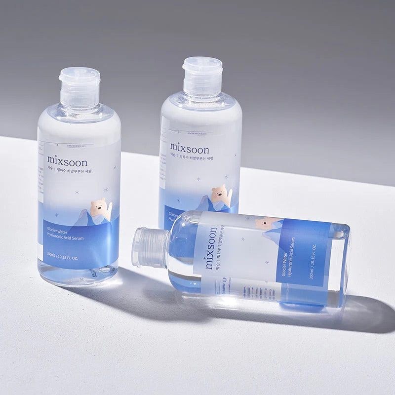Three 'mixsoon' skincare bottles on a light gray background