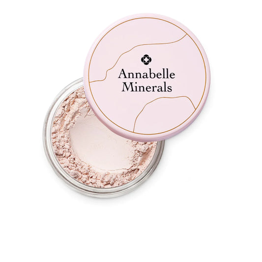 A jar of Annabelle Minerals mineral eyeshadow in a light shade with yellow and white hints, suitable for fair complexions.