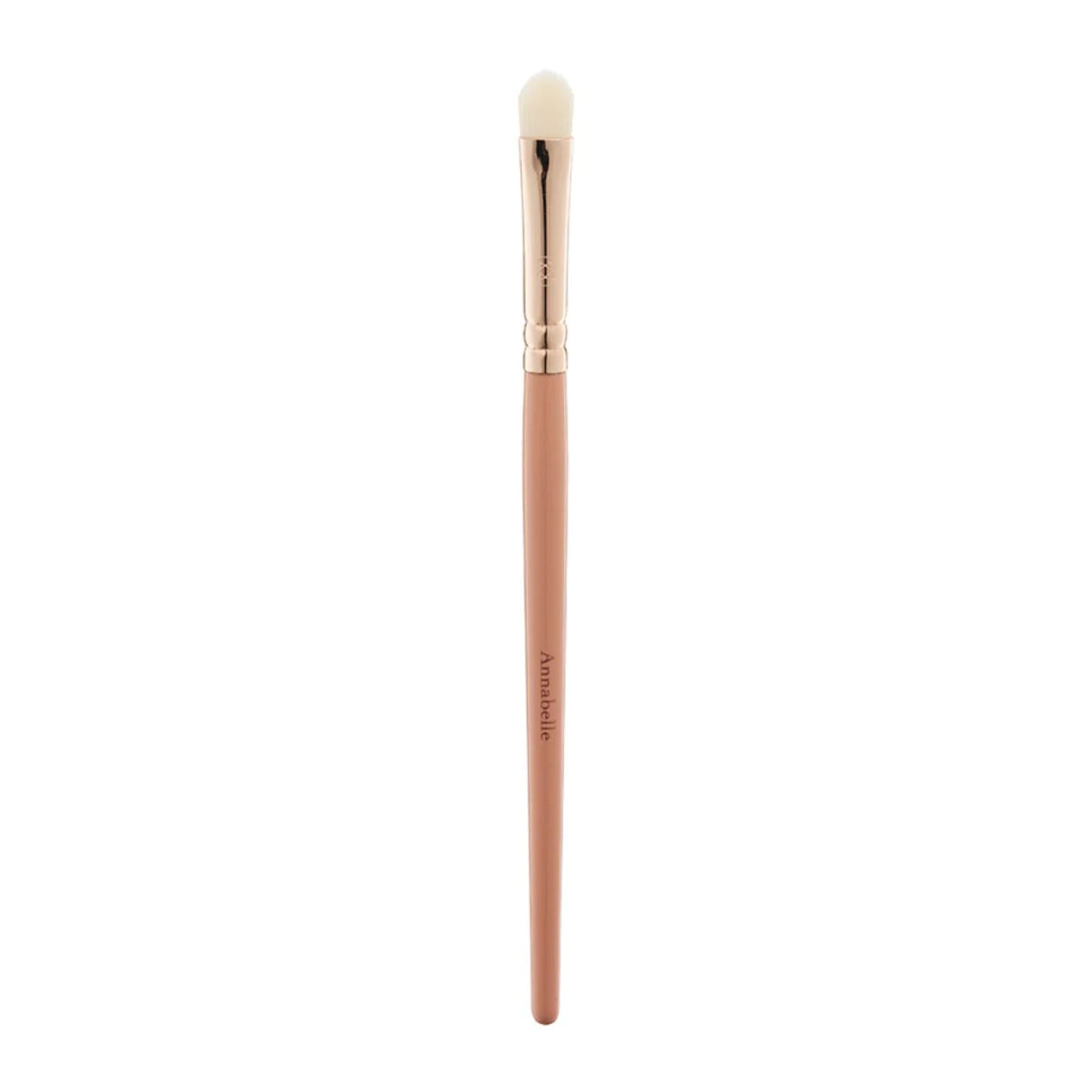 Makeup brush with rose gold ferrule on a white background