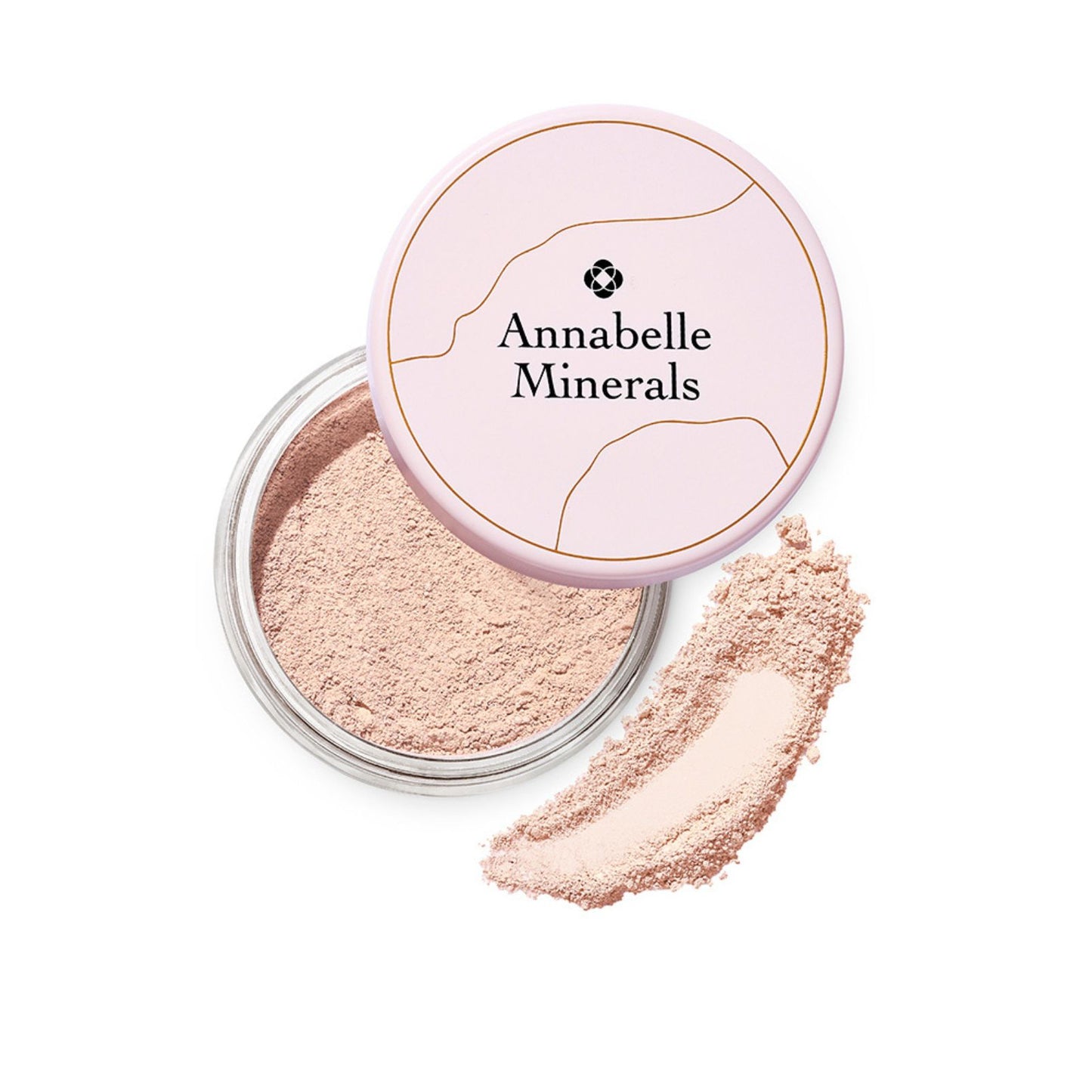 A jar of Annabelle Minerals mineral foundation powder with a swatch of the product next to it, showing a beige color suitable for fair skin with an olive undertone.