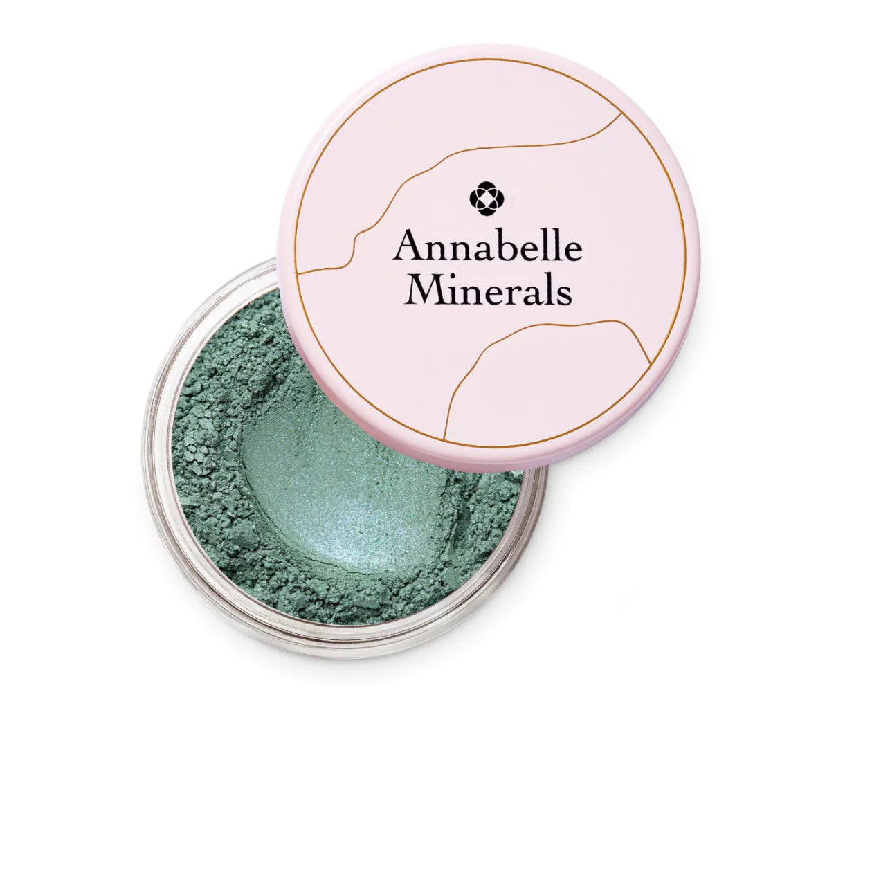 Open container of Annabelle Minerals with green powder inside on a white background