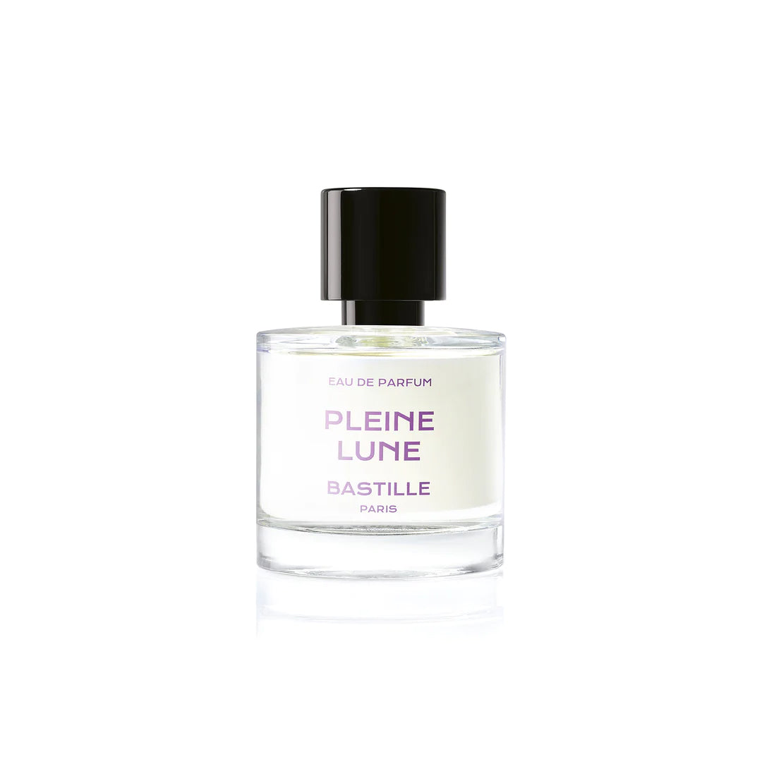A bottle of Pleine Lune EDP perfume next to its purple box, with the brand name BASTILLE Paris visible.