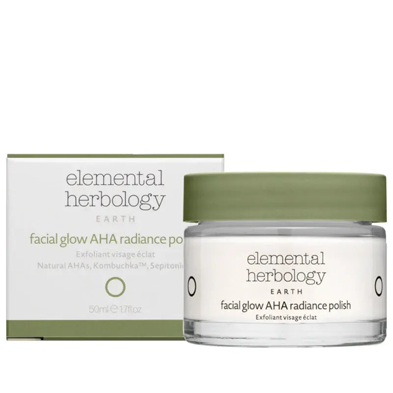 A product image showing Elemental Herbology Facial Glow AHA Radiance Polish in a clear jar with a green lid, alongside its packaging box.