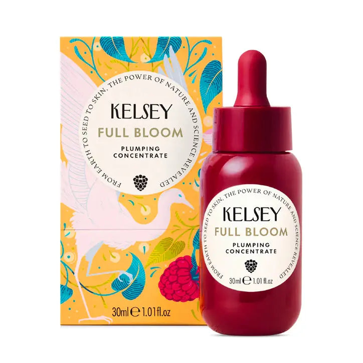 A red bottle of Kelsey Full Bloom Plumping Concentrate with a dropper, next to its colorful packaging box.