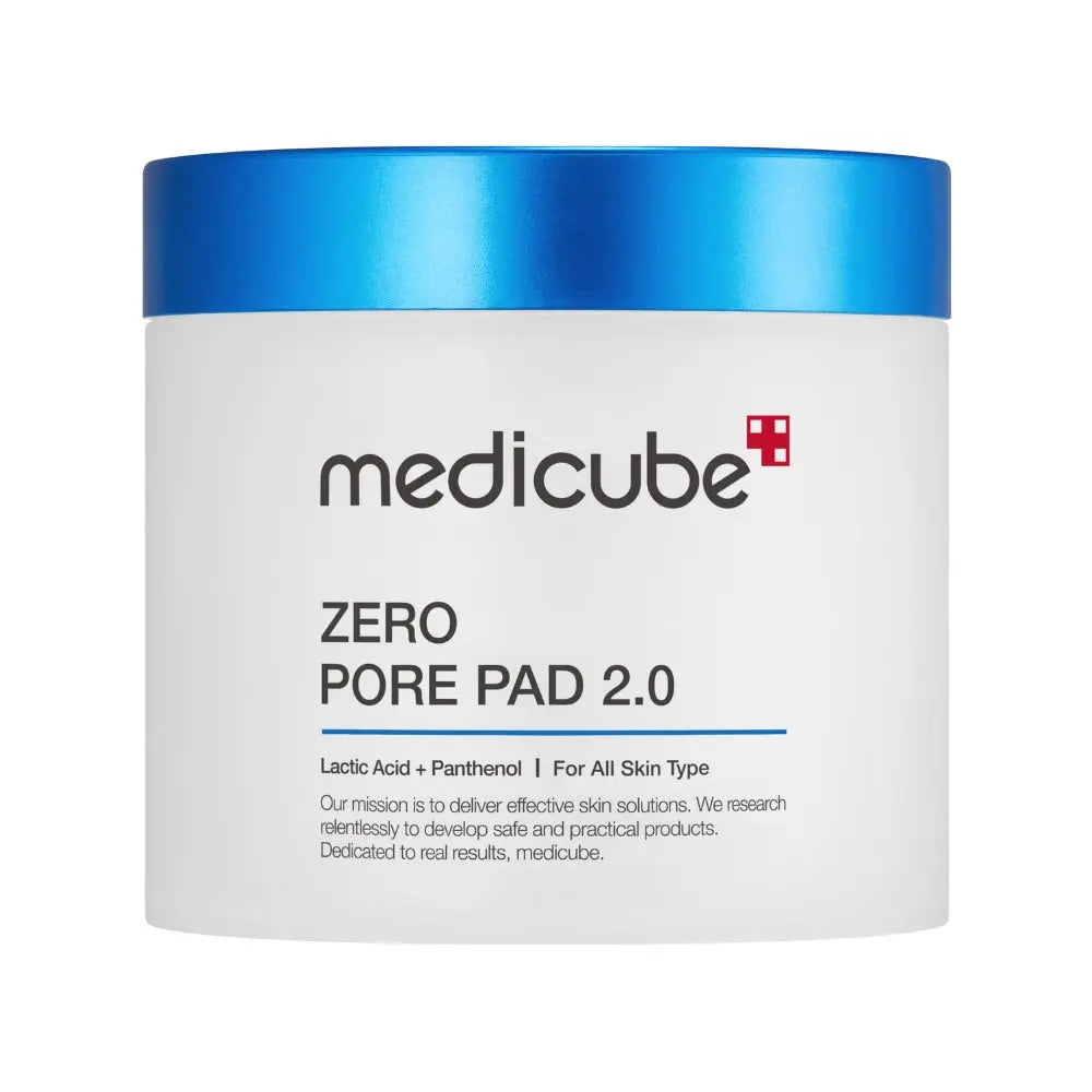 A container of Medicube Zero Pore Pad 2.0 with blue lid, white body, and product information printed on the label.