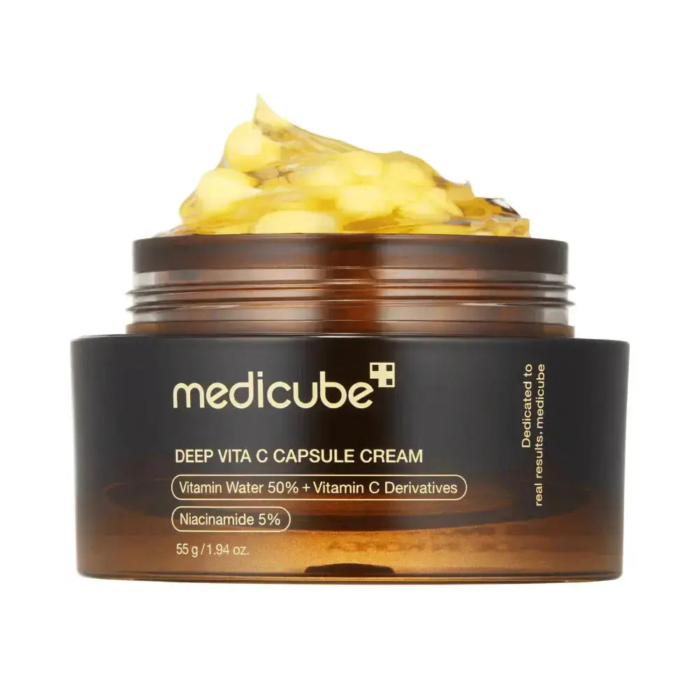 Medicube Deep Vita C Capsule Cream jar with cream on top on a white background